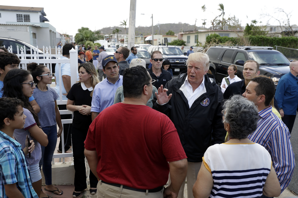 Le président américain a rencontré les habitants de l'île ravagée par l'ouragan Maria.