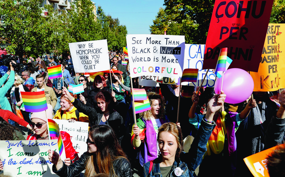 epa06256480 Participants join lesbian, gay, bisexual, and transgender (LGBT) rights groups during Kosovo's first-ever pride parade held in Pristina, Kosovo, 10 October 2017.  EPA/VALDRIN XHEMAJ KOSOVO PRIDE PARADE