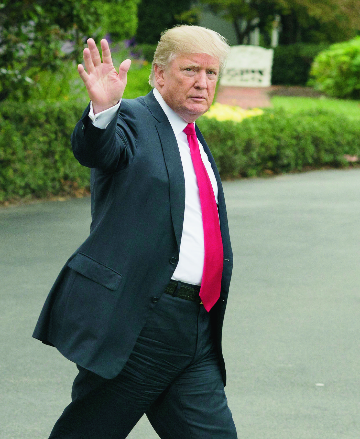epa06259883 US President Donald J. Trump waves as he walks out to depart the South Lawn of the White House by Marine One in Washington DC, USA, 11 October 2017. Trump travels to Harrisburg, Pennsylvania, to deliver remarks on his tax agenda.  EPA/MICHAEL REYNOLDS USA TRUMP WHITE HOUSE