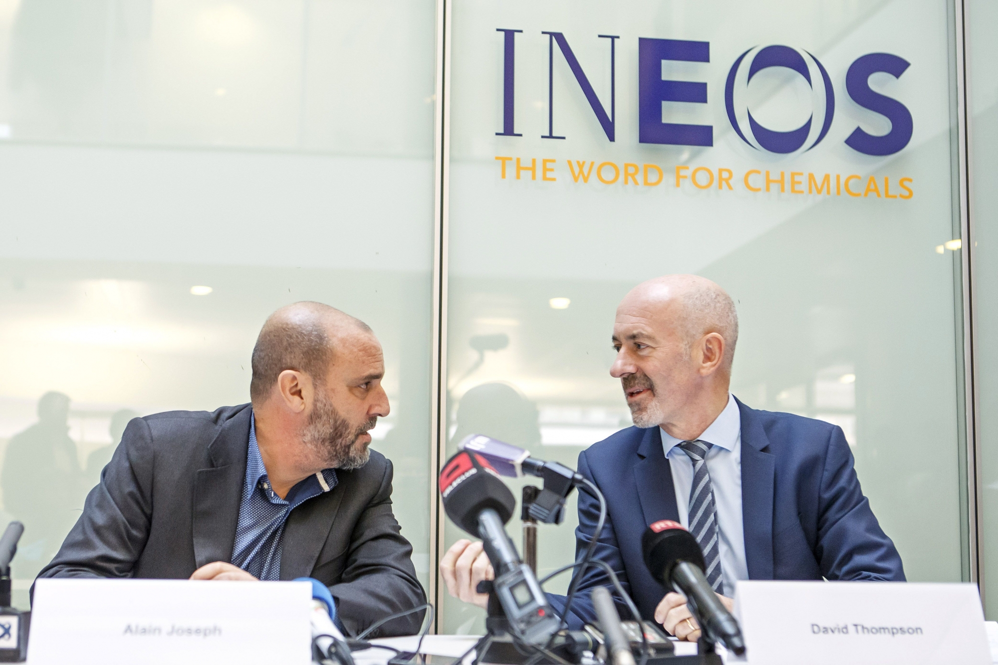 The new president of the FC Lausanne-Sport David Thompson, right, CEO of INEOS, speaks next to Alain Joseph, left, former President of FC Lausanne-Sport, during a press conference announcing that Lausanne-Sport was bought by the company INEOS, in Rolle, canton of Vaud, Switzerland, on Monday, November 13, 2017. (KEYSTONE/Salvatore Di Nolfi)