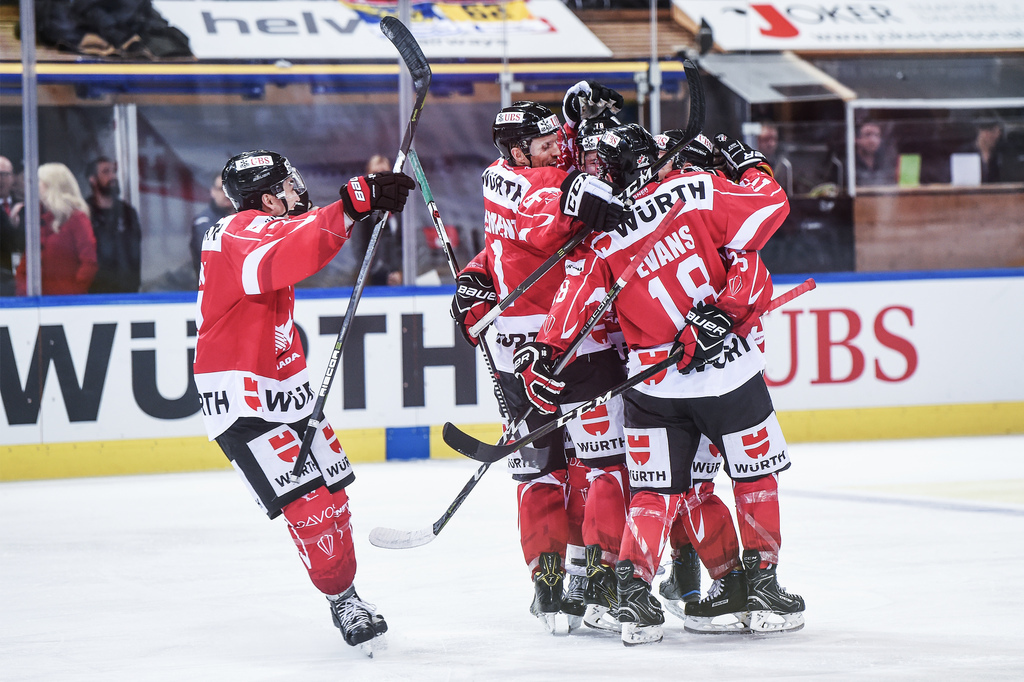 Canada`s goalgetter Maxim Noreau and the team celebrate after scoring 2:0 during the final game between Team Canada and Team Suisse at the 91th Spengler Cup ice hockey tournament in Davos, Switzerland, Sunday, December 31, 2017. (KEYSTONE/Melanie Duchene)