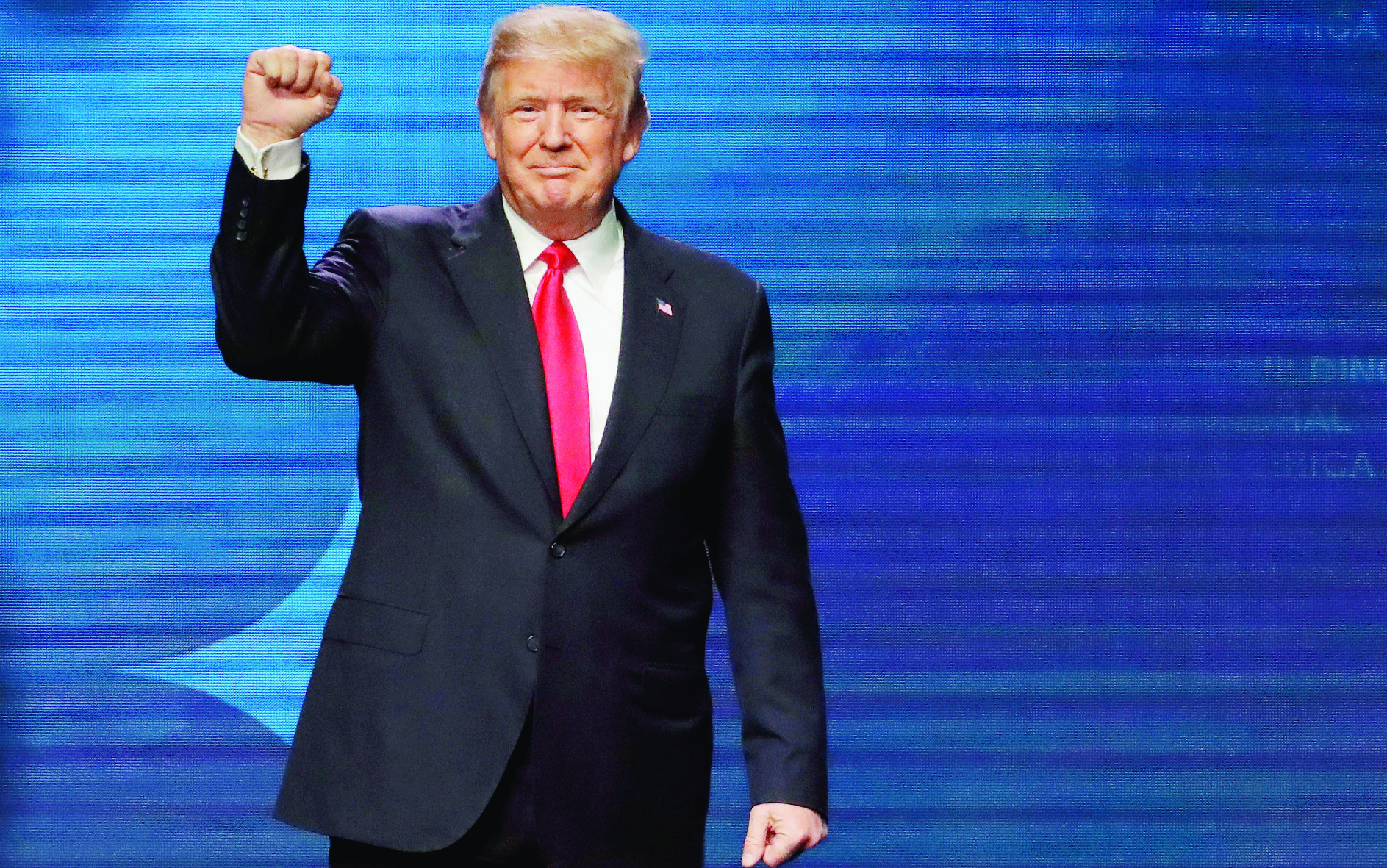 President Donald Trump acknowledges applause after speaking at the American Farm Bureau Federation annual convention Monday, Jan. 8, 2018, in Nashville, Tenn. (AP Photo/Mark Humphrey) Trump