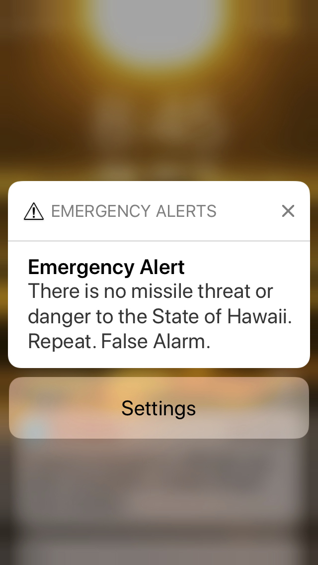 FILE - This Jan. 13, 2018 file smartphone screen capture shows the retraction of a false incoming ballistic missile emergency alert sent from the Hawaii Emergency Management Agency. Gov. David Ige has appointed state Army National Guard Brig. Gen. Kenneth Hara as new head of Hawaii's emergency management agency after a faulty alert was sent to cellphones around the state warning of an incoming missile attack. (AP Photo/Caleb Jones, file) Hawaii-Mistaken Missile Alert