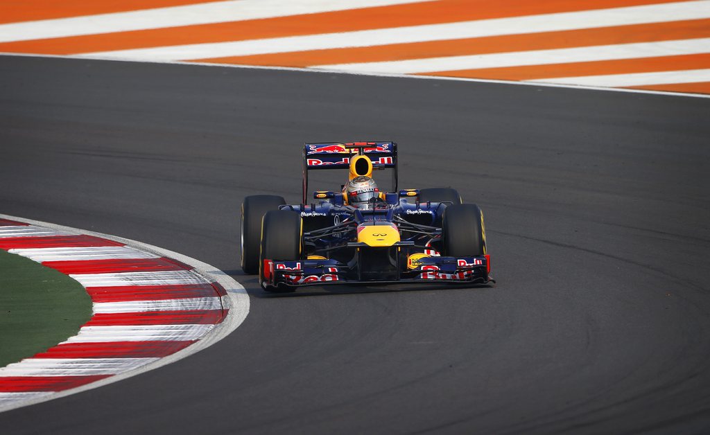 Red Bull driver Sebastian Vettel of Germany steers his car during the qualifying session for the Indian Formula One Grand Prix at the Buddh International Circuit in Noida, on the outskirts of New Delhi, India, Saturday, Oct. 27, 2012. (AP Photo/Saurabh Das)