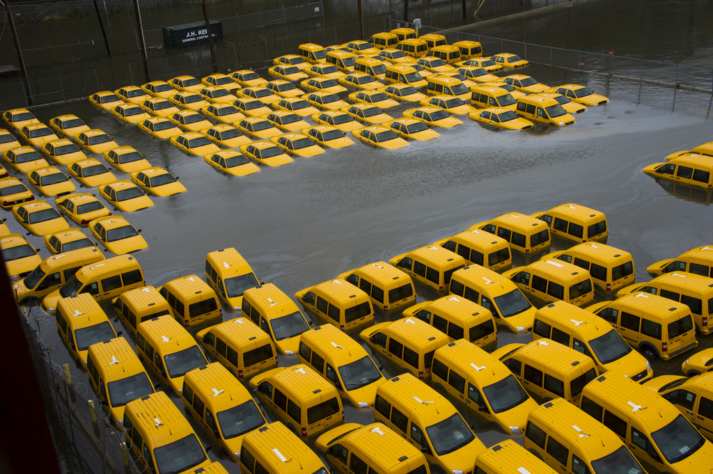 A parking lot full of yellow cabs is flooded as a result of Hurricane Sandy on Tuesday, Oct. 30, 2012 in Hoboken, NJ. (AP Photo/Charles Sykes)