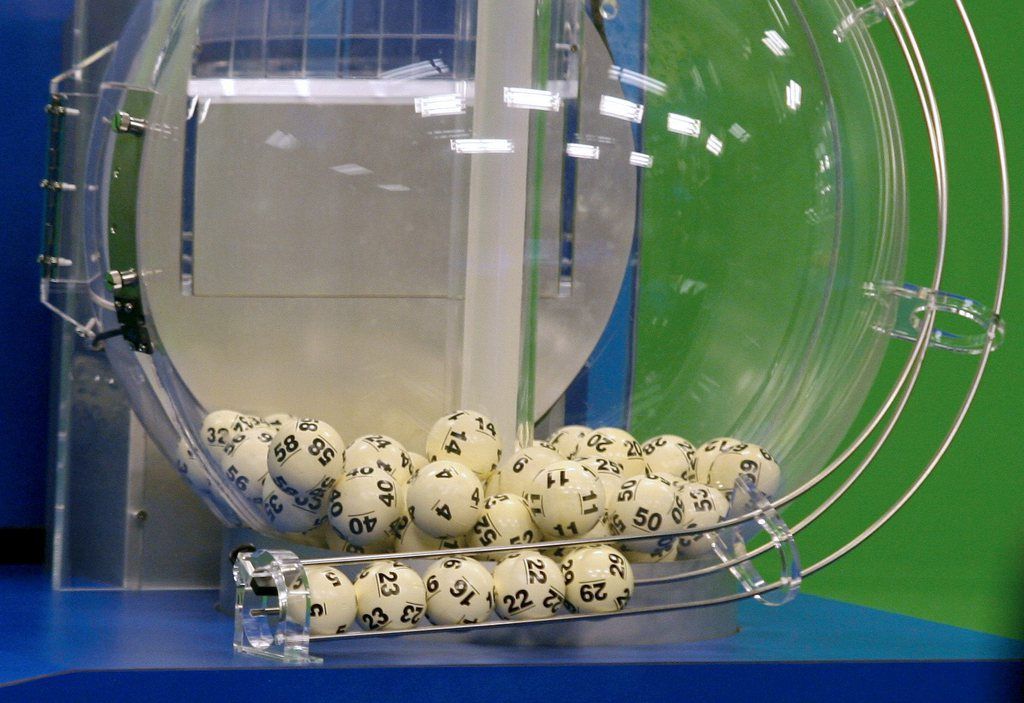 Powerball numbers are chosen in the drawing at the Florida Lottery on Wednesday, Nov. 28, 2012, in Tallahassee, Fla. The numbers drawn in the $579.9-million game were: 5, 16, 22, 23, 29 and Powerball of 6. (AP Photo/Phil Sears)