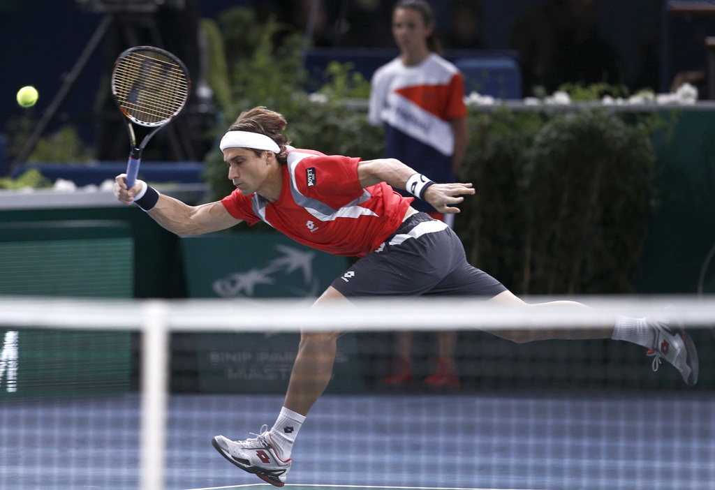 David Ferrer tient son premier titre en Masters 1000. L'Espagnol s'est imposé face au Polonais Jerzy Janowicz en finale de Paris-Bercy.