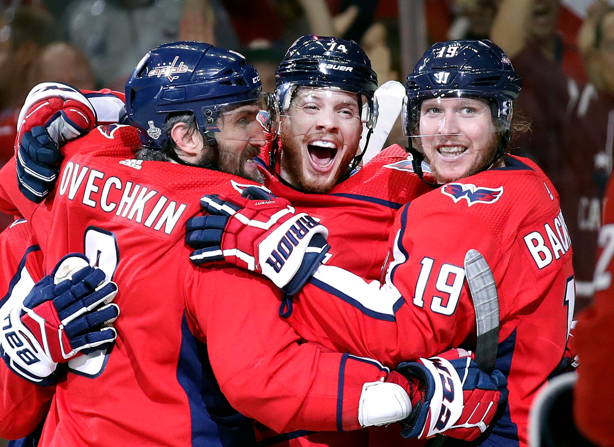 Washington Capitals defenseman John Carlson, center, celebrates his goal against the Vegas Golden Knights with Alex Ovechkin, left, of Russia, and Nicklas Backstrom, right, of Sweden, during the second period in Game 4 of the NHL hockey Stanley Cup Final, Monday, June 4, 2018, in Washington. (AP Photo/Alex Brandon) APTOPIX STANLEY CUP GOLDEN KNIGHTS CAPITALS HOCKEY