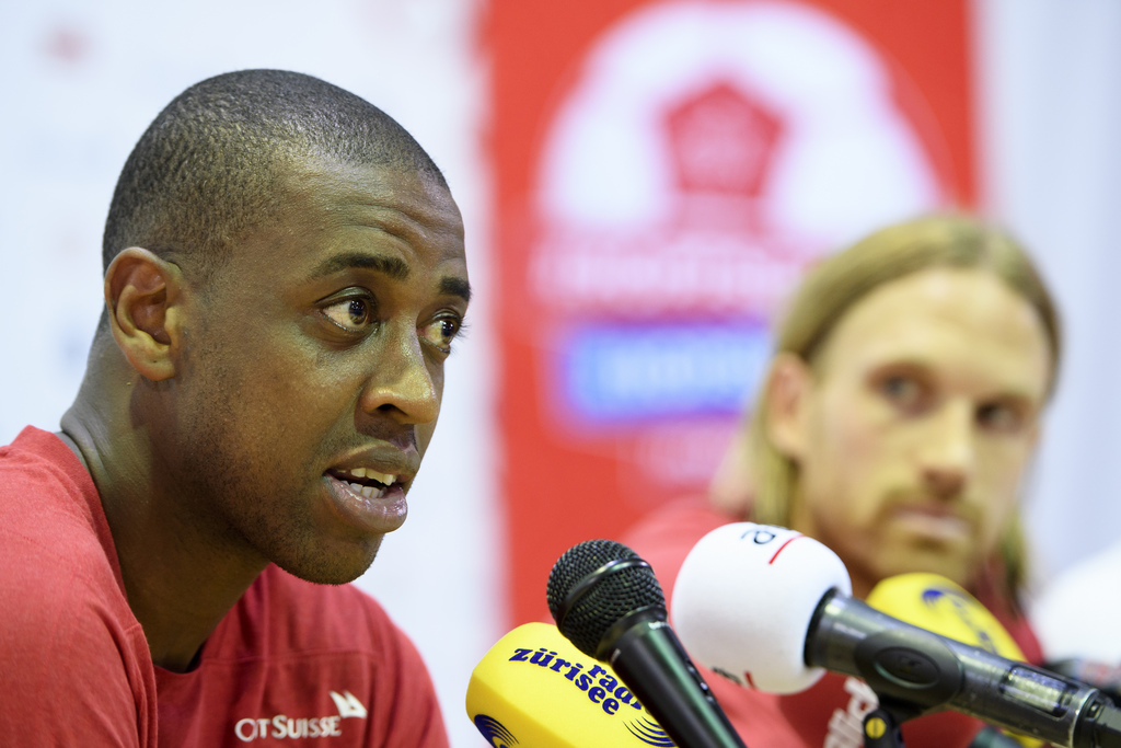 Switzerland's midfielder Gelson Fernandes, left, and Switzerland's defender Michael Lang, right, speaks during a press conference after a closed training session of the Switzerland's national soccer team at the Torpedo Stadium, in Togliatti, Russia, Monday, June 25, 2018. The Swiss team is in Russia for the FIFA World Cup 2018 taking place from 14 June until 15 July 2018. Team Switzerland is based in Togliatti in the Samara district. (KEYSTONE/Laurent Gillieron)