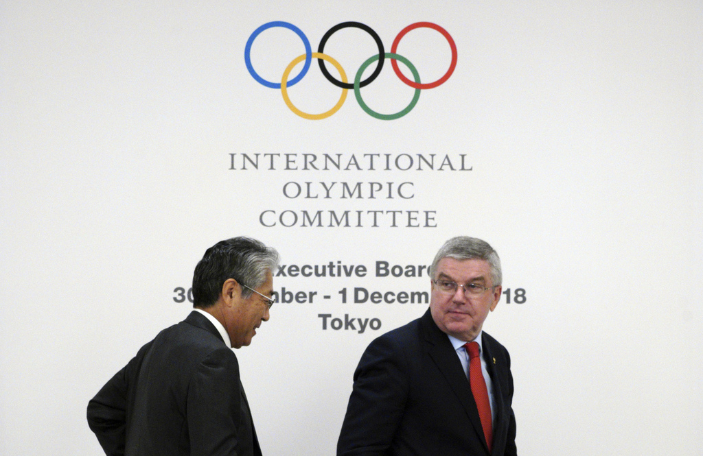 En décembre, la justice française a mis en examen le président du comité olympique japonais Tsunekazu Takeda, à gauche sur la photo. (Archives)