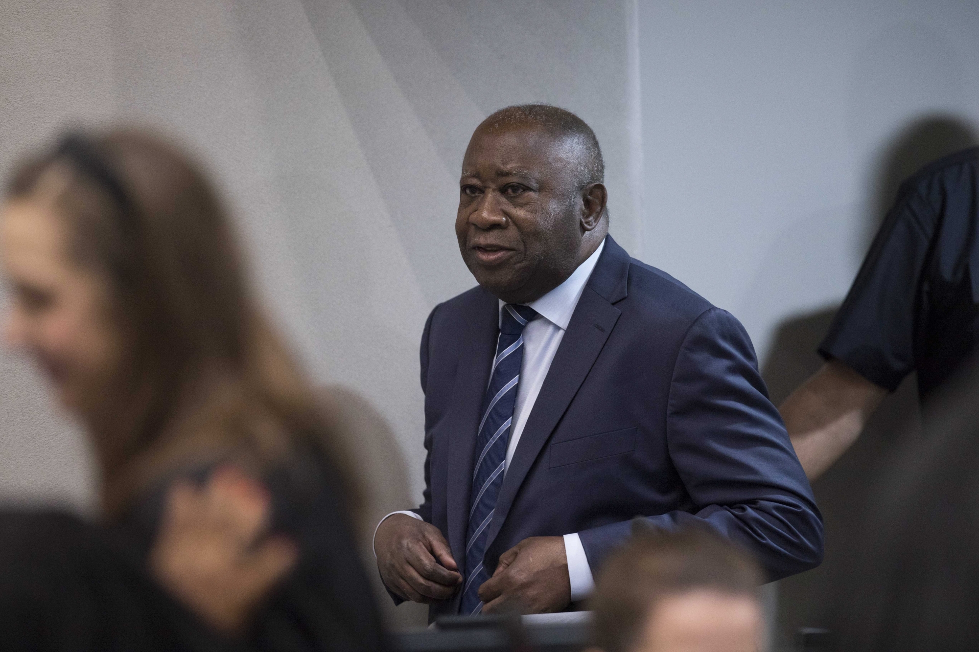 epa07285853 Former Ivory Coast President Laurent Gbagbo enters the courtroom of the International Criminal Court  in The Hague, Netherlands, 15 January 2019, where judges were expected to issue rulings on requests by Gbagbo and ex-government minister Charles Ble Goude to have their prosecutions thrown out for lack of evidence.  EPA/PETER DEJONG / POOL NETHERLANDS TRIAL LAURENT GBAGBO AT ICCH