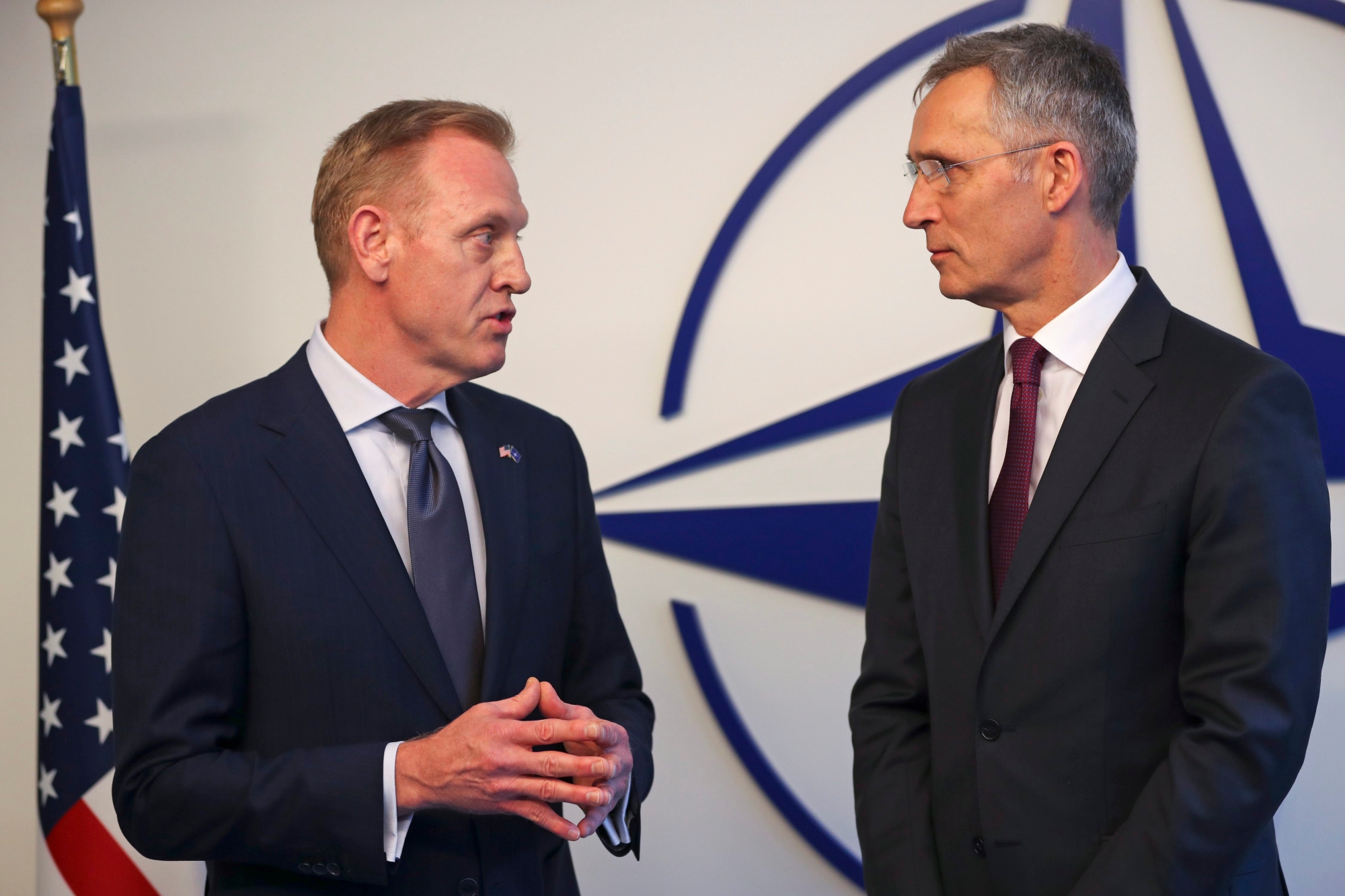 epa07367240 Acting US Defence Secretary Patrick Shanahan (L)  talks to NATO's Secretary General Jens Stoltenberg for the media during a meeting of NATO defence ministers at NATO headquarters in Brussels, Belgium, 13 February 2019.  EPA/Francisco Seco BELGIUM NATO DEFENSE MINISTERS COUNCIL