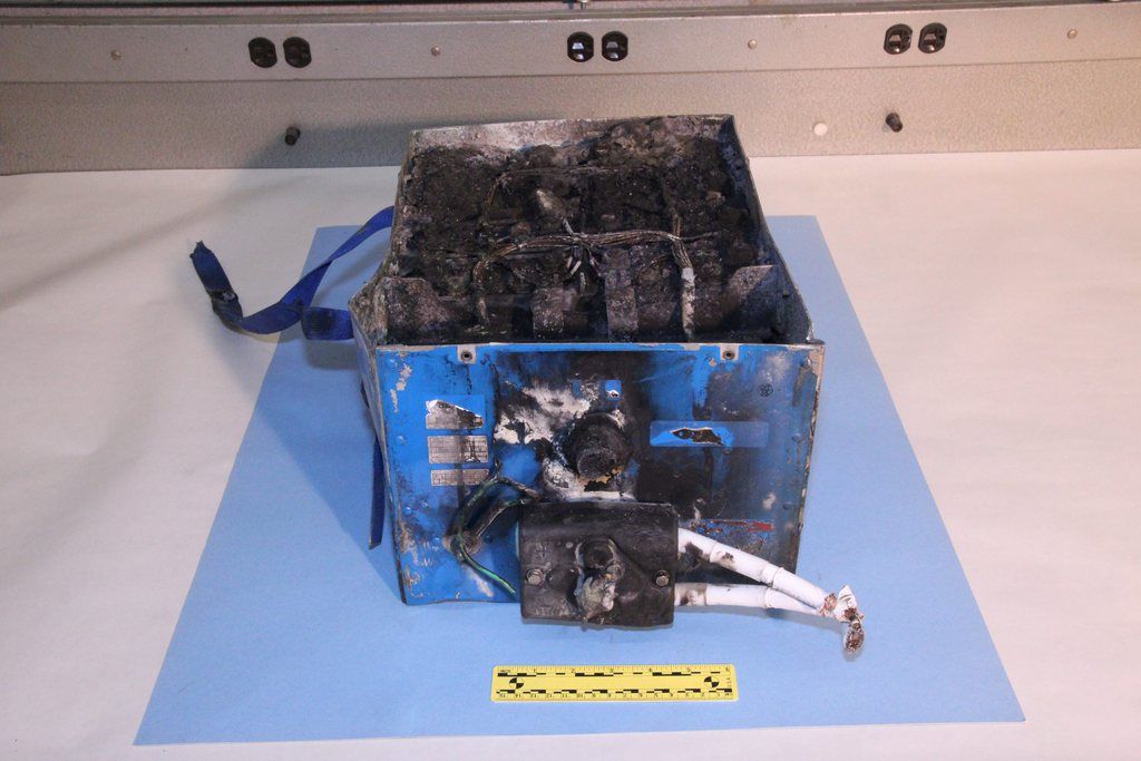 This undated image provided by the National Transportation Safety Board shows the burned auxiliary power unit battery from a JAL Boeing 787 that caught fire on Jan. 7, 2013, at Boston's Logan International Airport.  Federal officials said on Wednesday, Jan. 16, 2013, that they are temporarily grounding Boeing's 787 Dreamliners until the risk of possible battery fires is addressed. (AP Photo/National Transportation Safety Board)