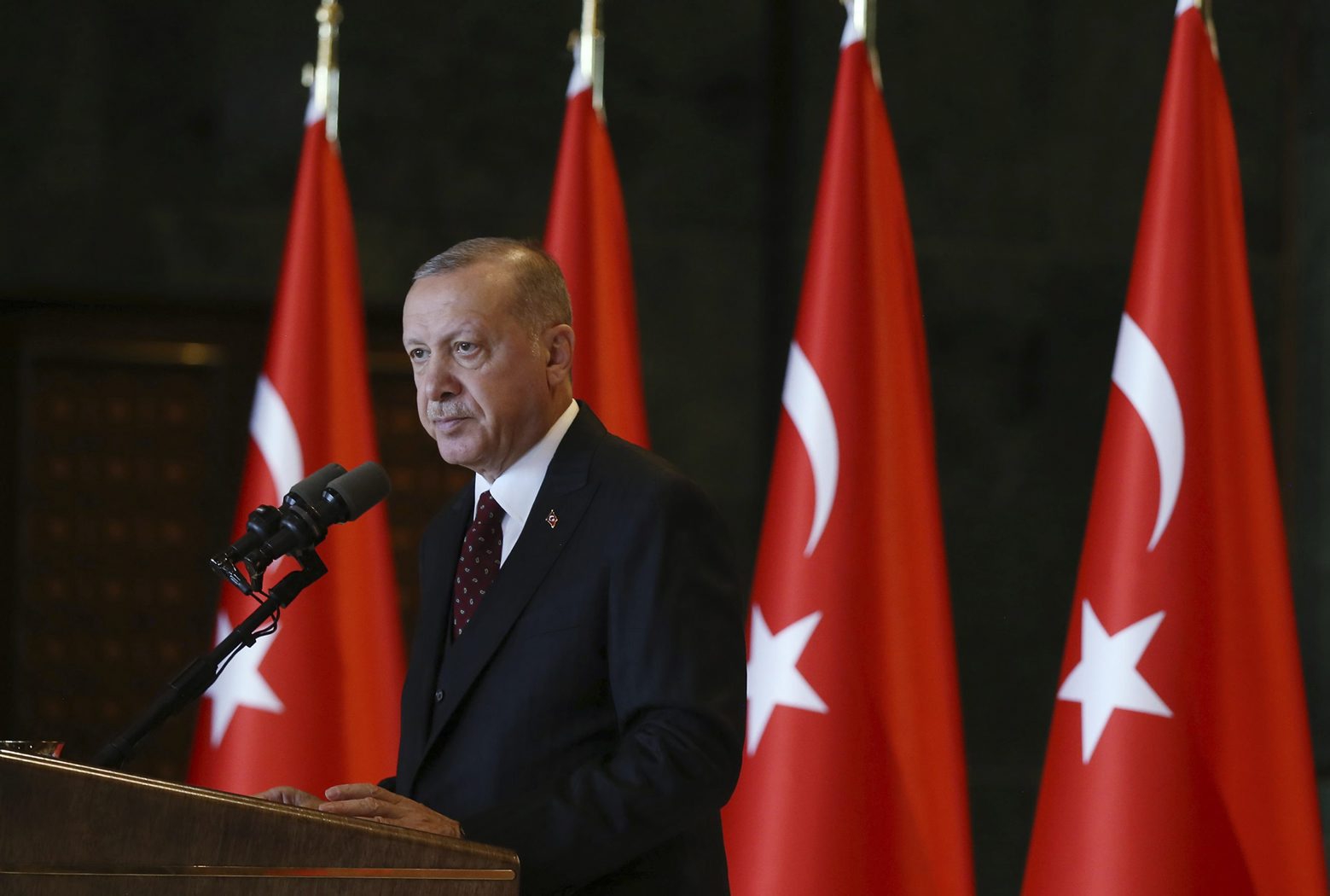 Turkey's President Recep Tayyip Erdogan addresses his country's ambassadors in Ankara, Turkey, Tuesday, Aug. 6, 2019. Turkey's combative president is threatening to launch a military operation in northeastern Syria that is designed to push back U.S.-allied Syrian Kurdish forces, an invasion that carries major risks for a highly combustible region in war-devastated Syria.(Presidential Press Service via AP, Pool) Turkey Syria