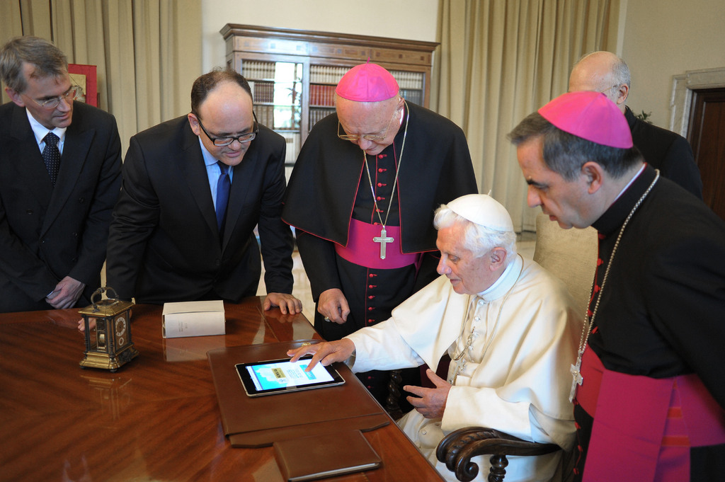 Pope Benedict XVI touches a touchpad to send a tweet for the launch of the Vatican news information portal "www.news.va", at the Vatican Tuesday, June 28, 2011. Benedict's tweet reads: "Dear Friends, I just launched News.va Praised be our Lord Jesus Christ! With my prayers and blessings, Benedictus XVI''. The portal was launched for the feast day of St.Peter and Paul, which falls on June 29 but officially begins with a vesper service June 28. (AP Photo/Osservatore Romano, HO, File) EDITORIAL USE ONLY