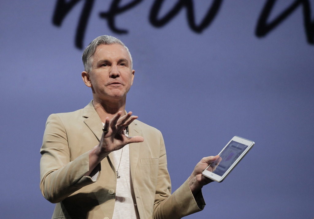 Baz Luhrmann, a movie writer, director and producer, discusses how he has recently been using a Samsung Galaxy Note 10.1, at a news conference, Wednesday, Aug. 15, 2012 in New York. Available in the U.S. starting Thursday, the $499 tablet comes with a pen, or more precisely, a stylus. The Galaxy Note shows that the pressure is building on the iPad, and Apple will have to work if it wants to maintain its lead. (AP Photo/Mark Lennihan)