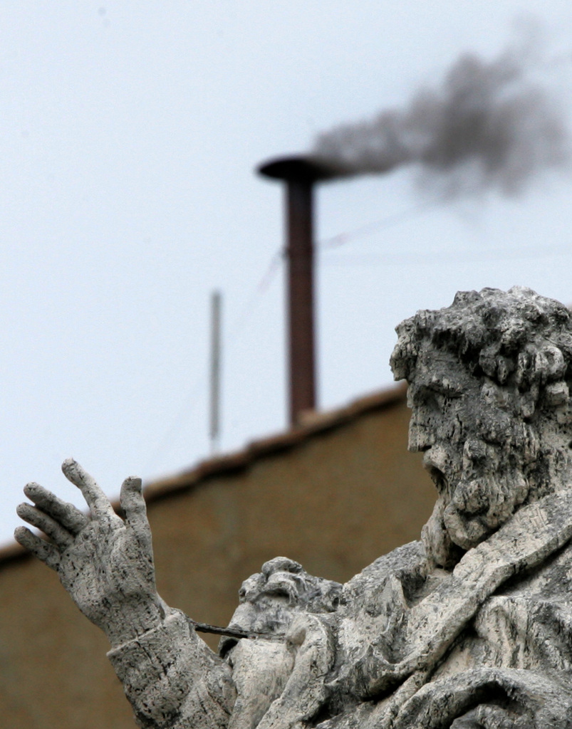 In this April 19, 2005 photo, black smoke billows from the chimney atop the Sistine Chapel at the Vatican, indicating that the cardinals gathered in the Conclave for the second consecutive day have not yet chosen the new pontiff. White smoke signals that cardinals have chosen a pope and he has accepted. The Vatican announced Monday, Feb. 11, 2013 that Pope Benedict XVI, who was elected pope in the 2005 conclave, is stepping down on Feb. 28, becoming the first pontiff in 600 years to resign. The conclave to elect a new pope must begin 15-20 days after Benedict's resignation. (AP Photo/Diether Endlicher)