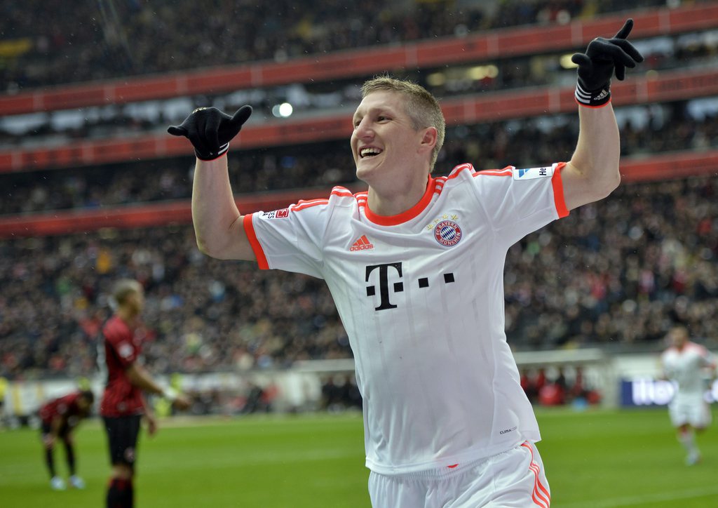 Le joueur du Bayern Bastian Schweinsteiger célèbre son but, synonyme de titre pour le club munichois.