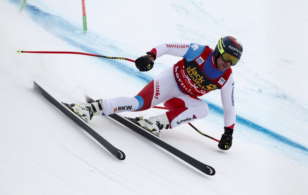 Switzerland's Beat Feuz competes during an alpine ski, men's World Cup downhill, in Bormio, Italy, Friday, Dec. 27, 2019. (AP Photo/Gabriele Facciotti)